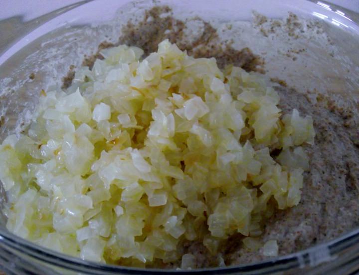 Adding sauteed onions to the rye sponge.
