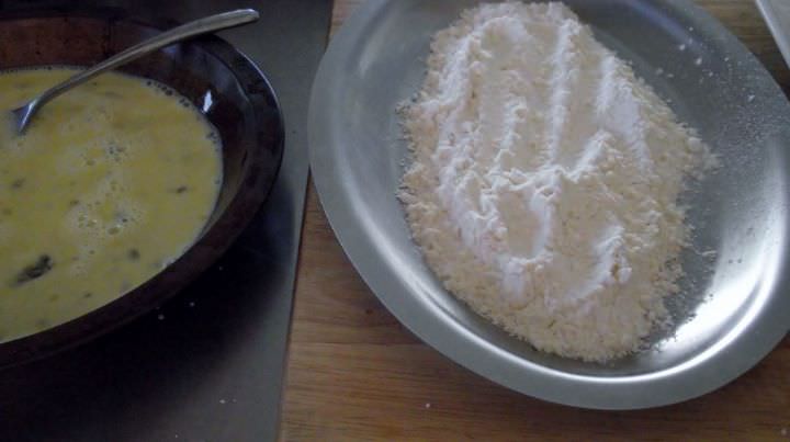 Flour and egg inseparate dishes for breading steaks.