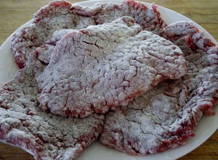 Steaks dredged in flour.