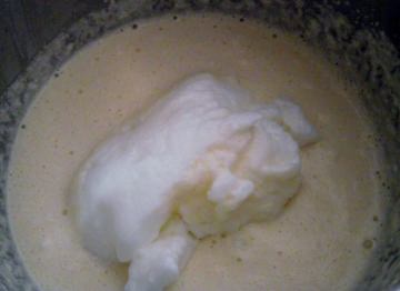 Folding egg whites into eggnog base