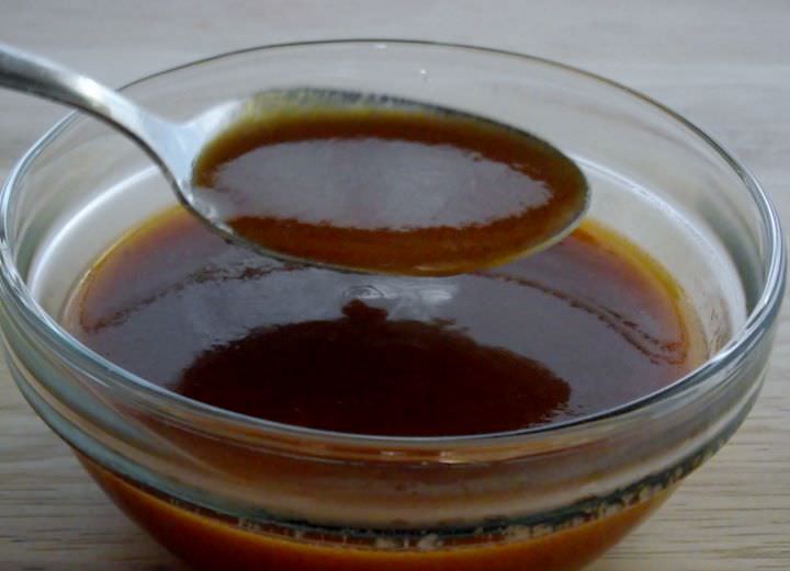 Spoon over a bowl of espagnole sauce.