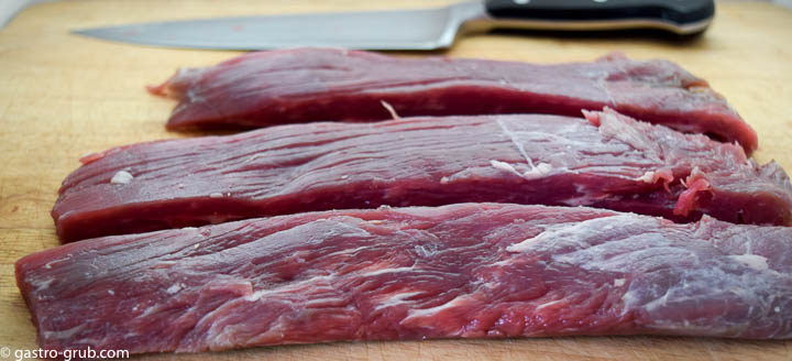 Flank steak cut into strips.