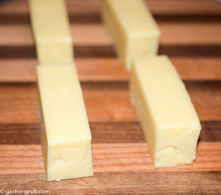 Gouda cheese cut into 1-inch squares.