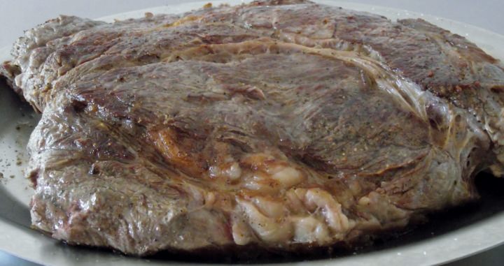 Seared chuck roast on a plate.