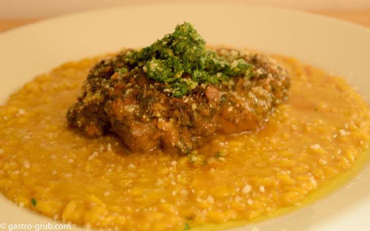 Risotto Milanese with osso buco Milanese and a sprinkling of Parmigiano-Reggiano and a drizzle of extra virgin olive oil.