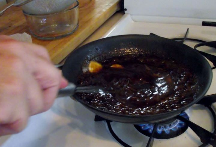 Finishing the pan sauce.