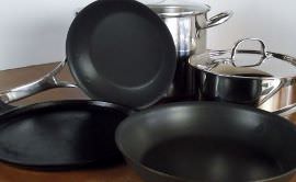 Cast iron griddle, nonstick frying pan and a 3-quart and 12-quart pot.