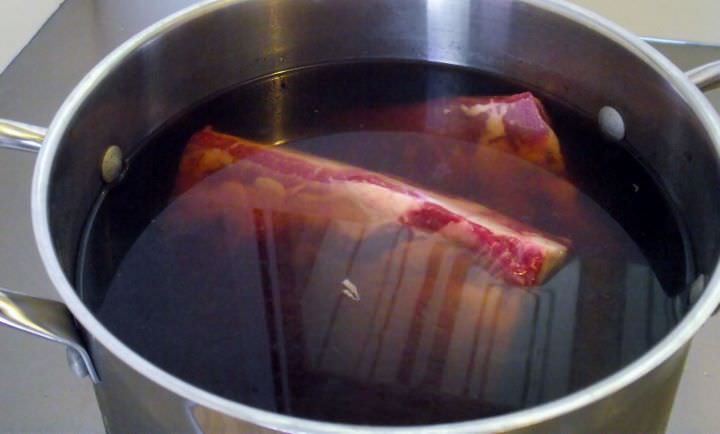 Pork ribs soaking in brine.