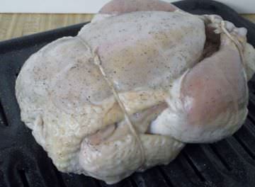 Trussed chicken ready for the oven.