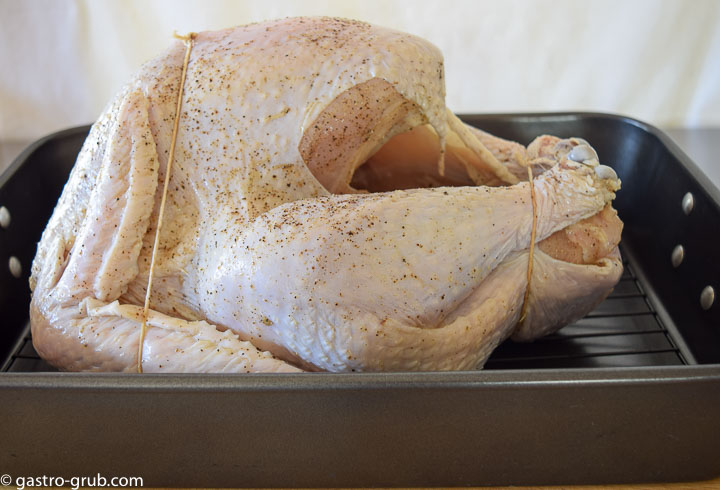Turkey in a roasting pan, ready for the oven.