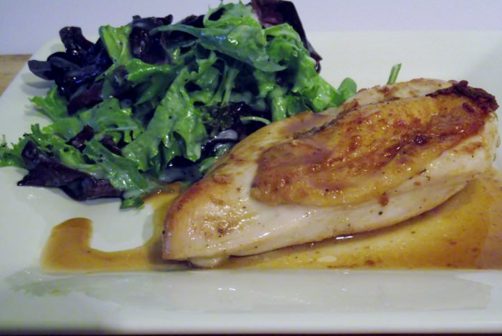 Seared baked chicken, pan sauce and a simple green salad.
