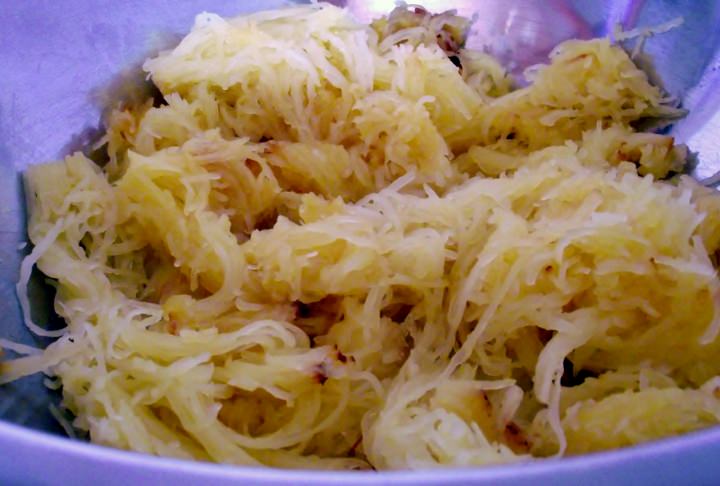 Spaghetti squash after it has been removed from its shell.