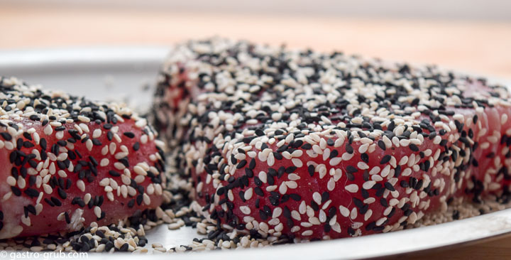 Tuna steaks dredged in white and black sesame seeds.