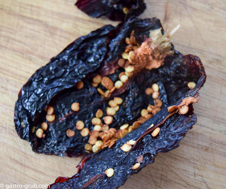 The ancho chili opened up exposing the seeds.