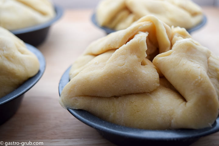 Apple pies filled and ready to bake.