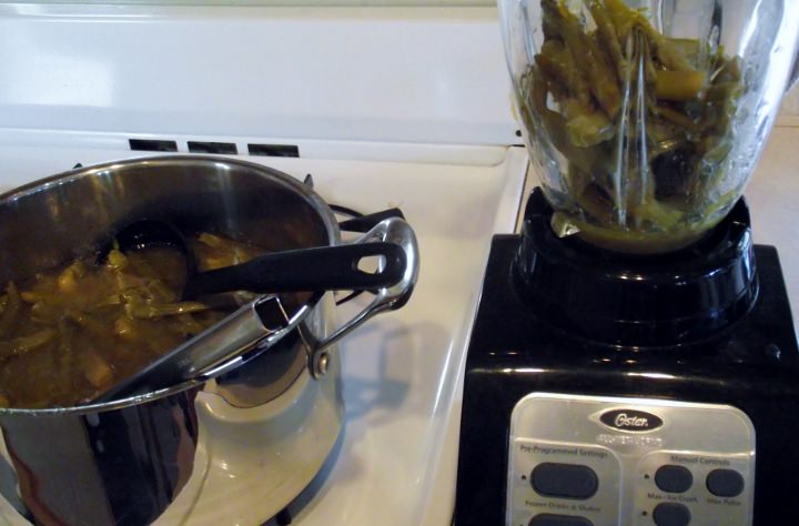 Pureeing the cooked asparagus soup.