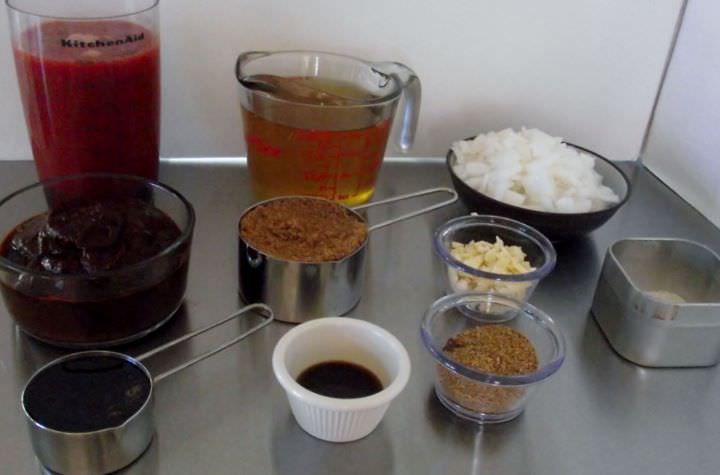 Ingredients for my barbecue sauce recipes: vinegar, spices, onion, garlic, chilies, and quick ketchup.