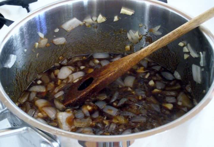 Barbecue sauce with showing the onions and garlic.
