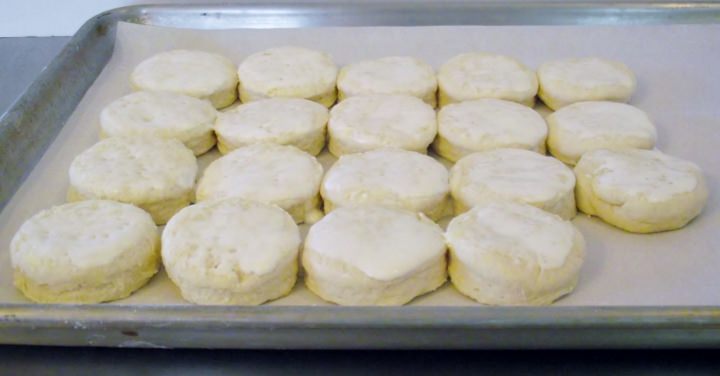 Roll the biscuits out and arrange on a sheet pan, just slightly touching.