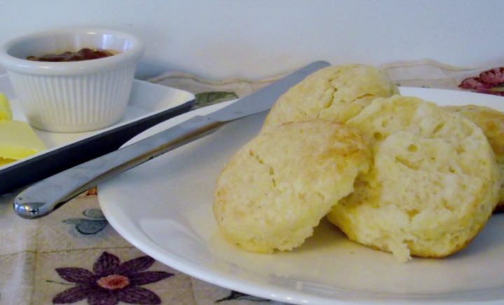 Buttermilk biscuits, apricot jam, and butter.