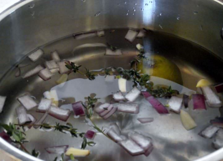 A basic brine with thyme, limes, garlic, and onion.