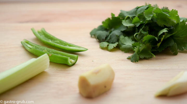 Ingredients for ceviche: cilantro, serrano peppers, celery, ginger, and garlic.