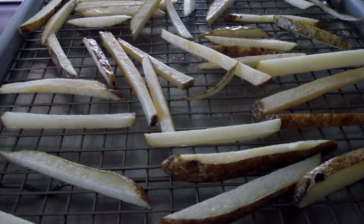 French fries cooling after being blanched.
