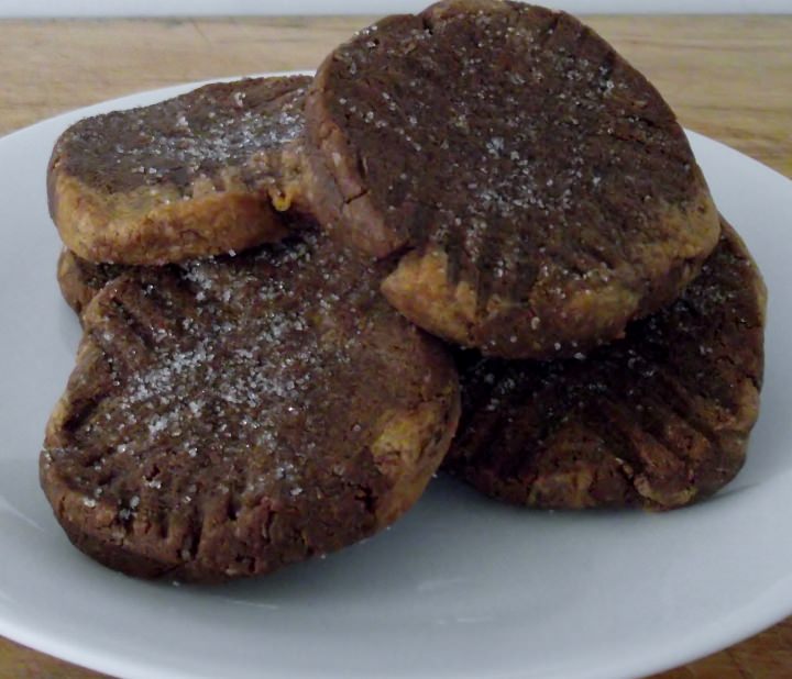 Gluten free, marbled peanut butter chocolate oatmeal cookies with flax seed and cinnamon, on a plate.