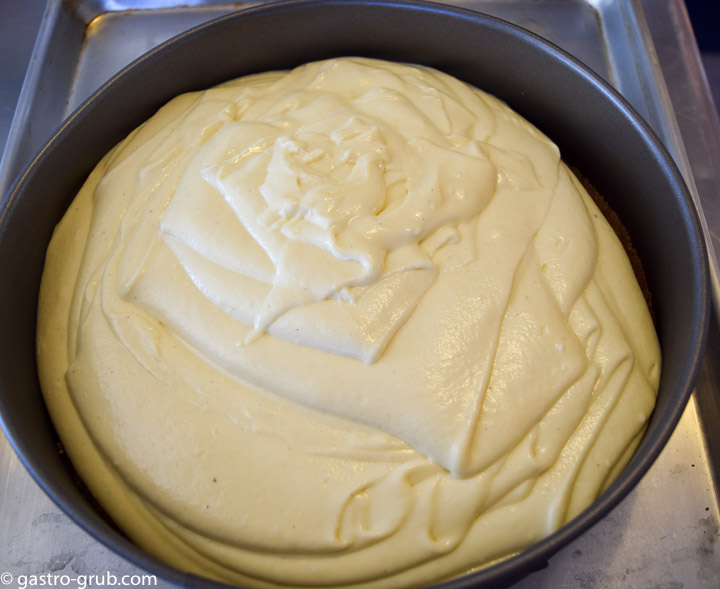 Adding the filling on top of the crust.