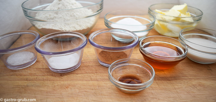 Ingredients for homemade graham crackers: whole wheat flour, all-purpose flour, salt, sugar, baking soda, baking powder, milk, honey, vanilla, and butter.