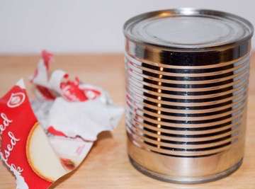 Sweetened condensed milk in the can, with the label removed.