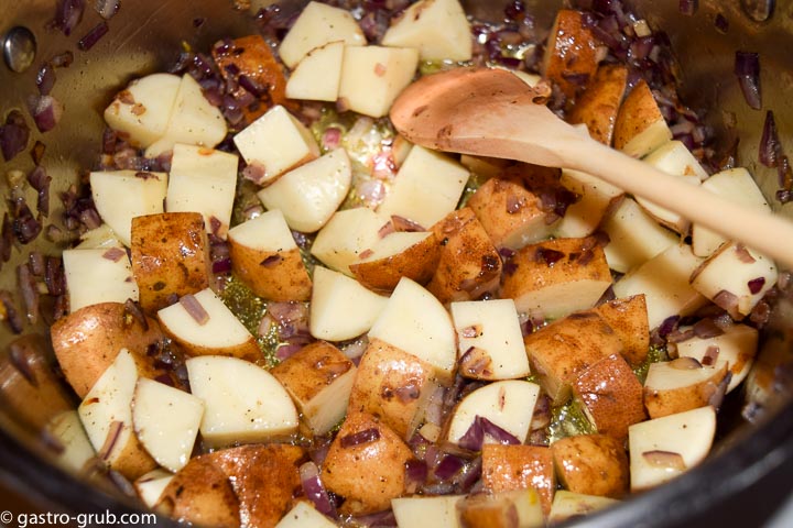 Add the potatoes and cook until the onion is lightly browned. Add the potatoes and cook until the onion is lightly browned.