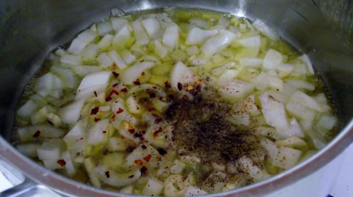 Sauteeing the onions, garlic, and pepper for the lima beans.