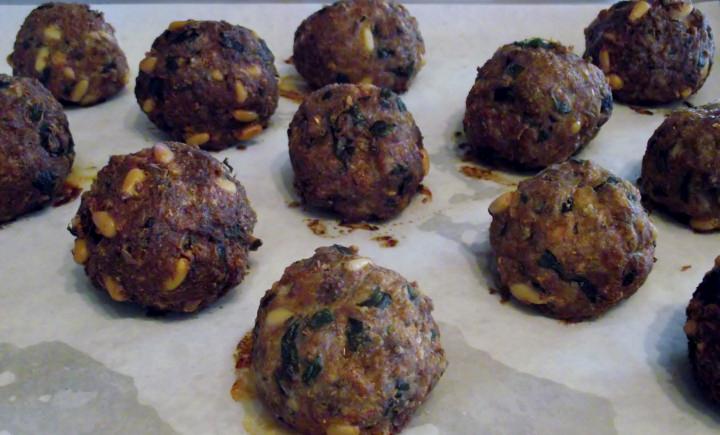 Meatballs on a sheet pan.