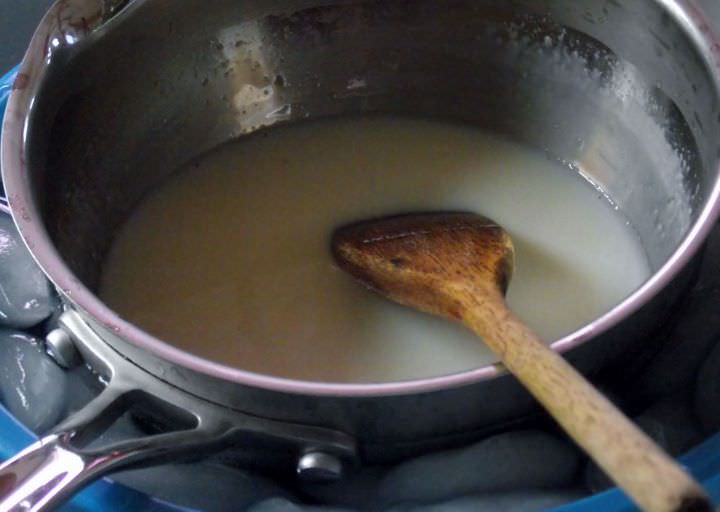 The milk mixture cooling in an ice bath.