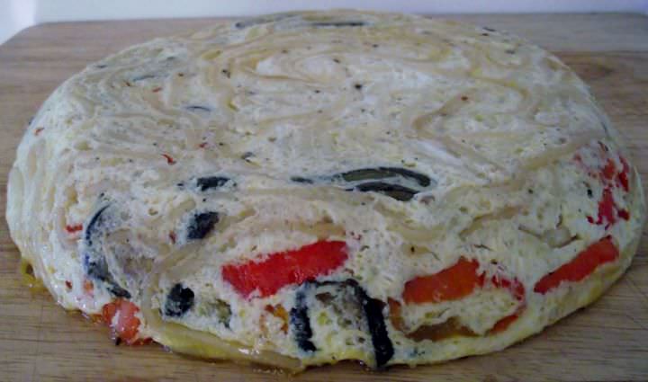 Pasta torte on a cutting board.