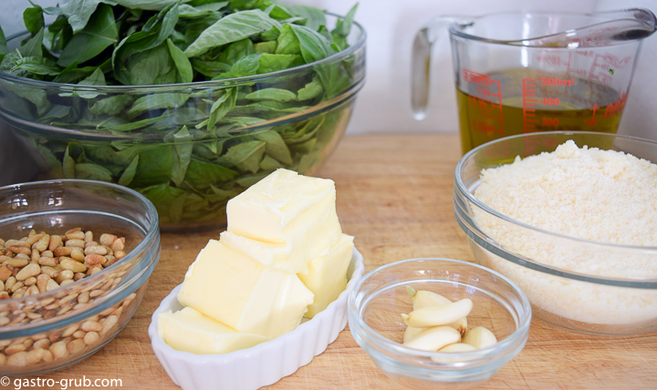 Ingredients for pesto: sweet basil, extra virgin olive oil, pine nuts, parmigiano-reggiano and pecorino romano, garlic, and butter.