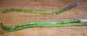 Snap The stem off the asparagus stalk.