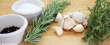 Ingredients for pork and beef sausage: kosher salt, black pepper, rosemary, garlic, and thyme.