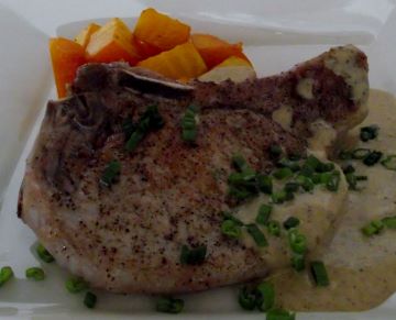 Fried pork chops with a pan sauce and golden beets.