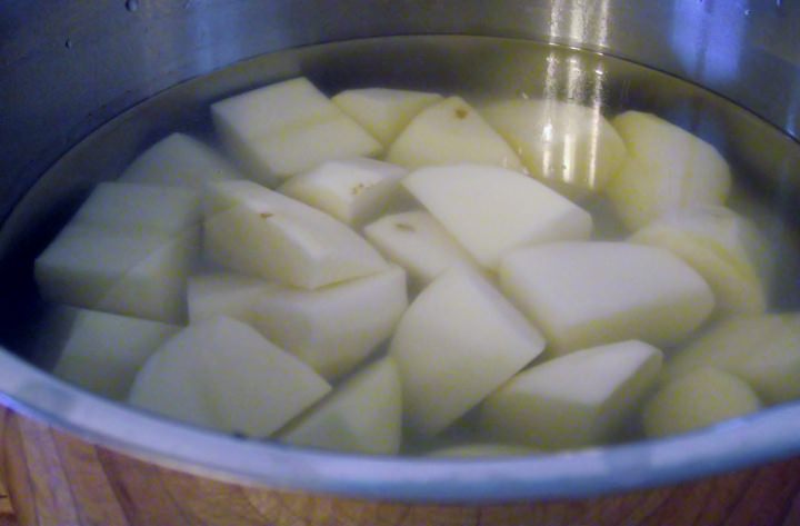 Potatoes in a pot with water.