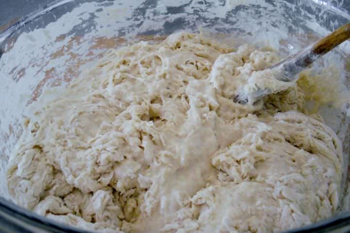 Mixing the ingredients for sourdough bread.