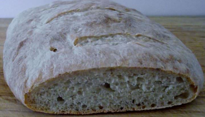 Sourdough bread sliced to show the texture of the crumb.