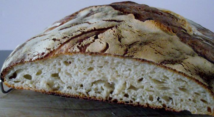 Sourdough bread sliced to show the texture of the crumb.