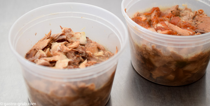 Shredded meat for tacos in pint containers.