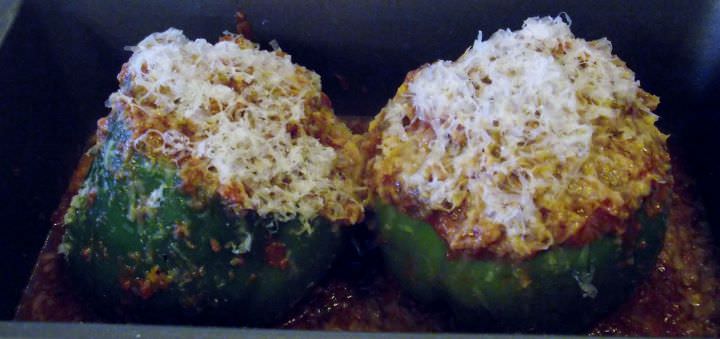 Brown rice stuffed bell pepper recipe with mushroom, onion, garlic, and Pecorion Romano.