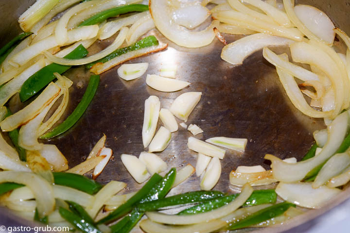 Sautéing the onion, peppers, and garlic for Spanish rice.