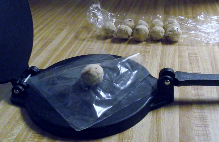 Tortilla press with masa ball