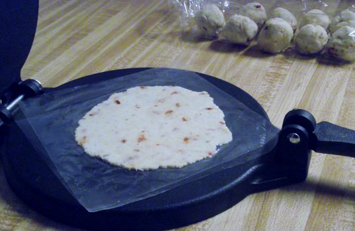 Pressing homemade tortillas
