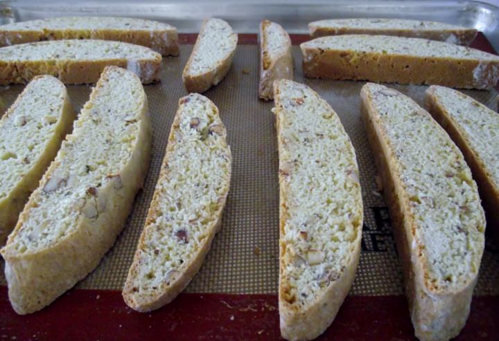 Arrange the biscotti, cut side down on the baking sheet.